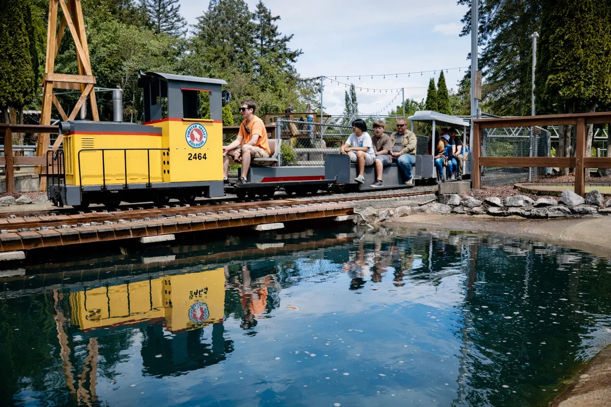 The yellow 2464 locomotive on the miniature railroad